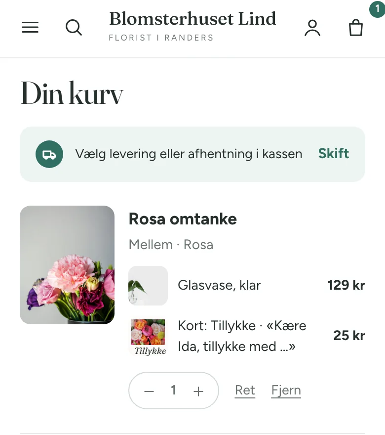 Kurven på en telefon med Rosa omtanke, Mellem og Rosa, glasvasen og kortet Tillykke med en forkortet hilsen samt knapperne Ret og Fjern